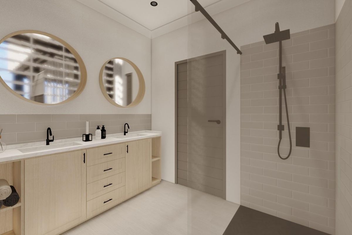 Modern bathroom featuring a double vanity with light wood cabinetry, integrated sinks, matte black fixtures, and a walk-in shower with subway tile surround.