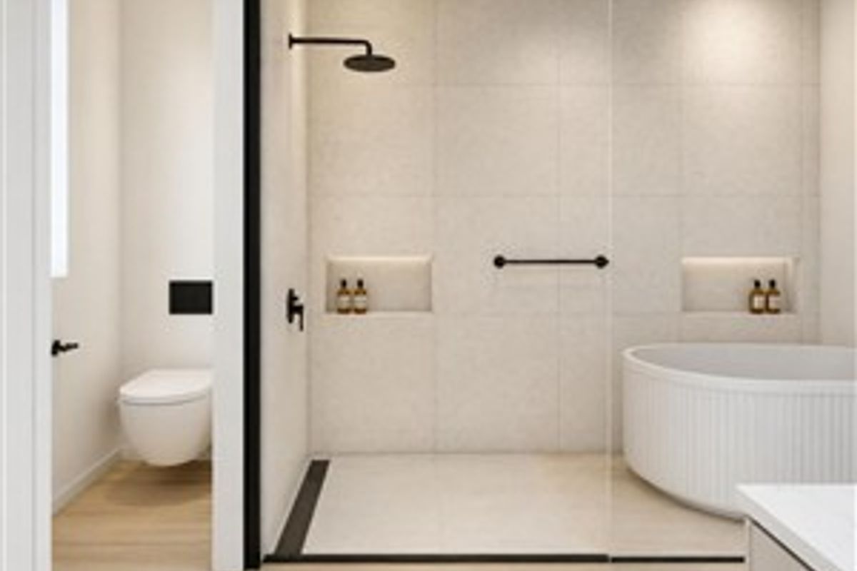 Modern bathroom featuring a walk-in shower with rain head, a freestanding bathtub, wall-mounted toilet, and elegant matte black fixtures with neutral tiling.
