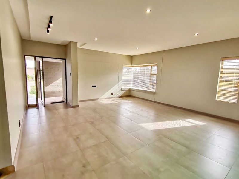 Stylish Coastal Family Home within Secure Estate! - Photo 4
