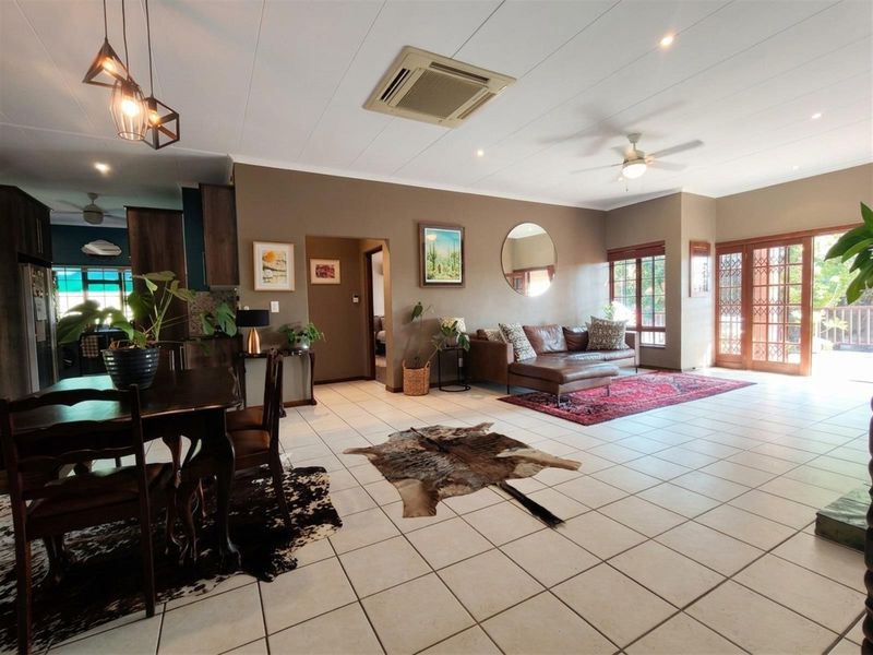Modern Family Home with Flatlet, Pool and Greenbelt Views in Sought-After Estate - Photo 8