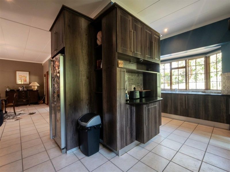 Modern Family Home with Flatlet, Pool and Greenbelt Views in Sought-After Estate - Photo 6