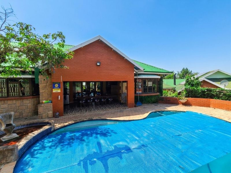 Modern Family Home with Flatlet, Pool and Greenbelt Views in Sought-After Estate - Photo 4