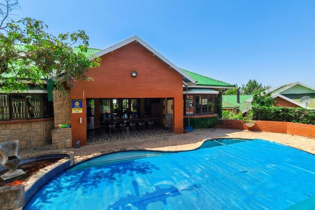 Modern Family Home with Flatlet, Pool and Greenbelt Views in Sought-After Estate - Photo 4