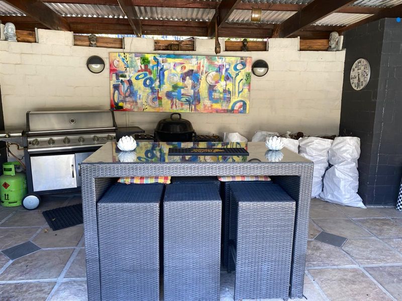 A sanctuary in the highly sought-after Helderberg slopes-Somerset West.Exceptional in/outdoor living - Photo 8