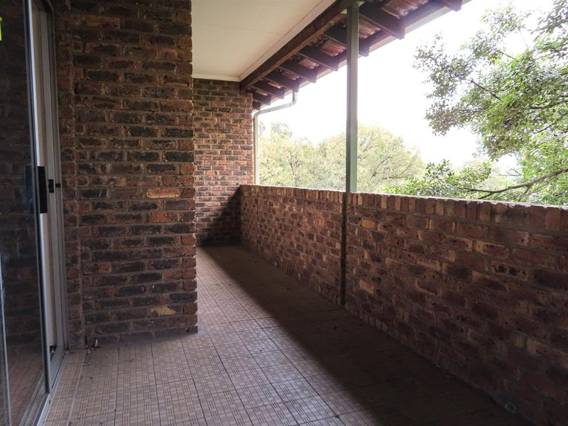 Sunny 2-Bedroom Home with Balcony in Well-Maintained Complex - Photo 7