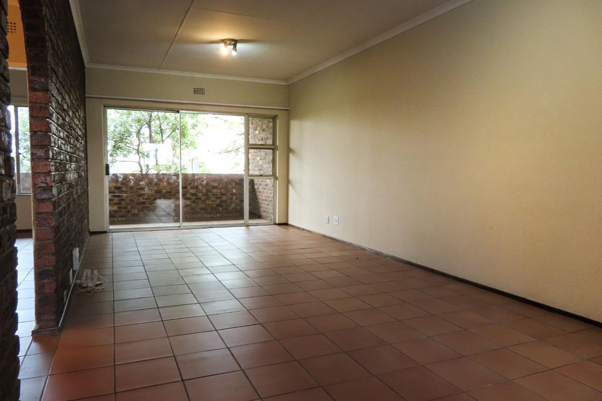 Sunny 2-Bedroom Home with Balcony in Well-Maintained Complex - Photo 2