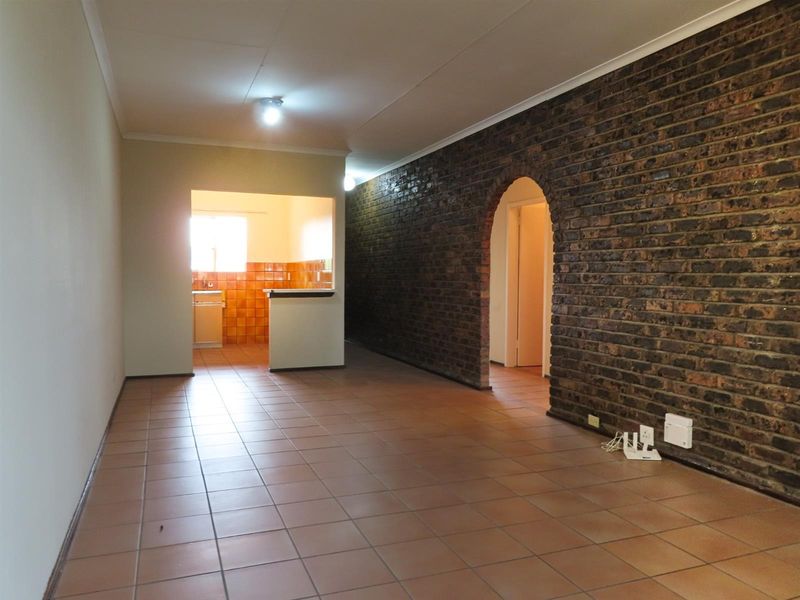 Sunny 2-Bedroom Home with Balcony in Well-Maintained Complex - Photo 3