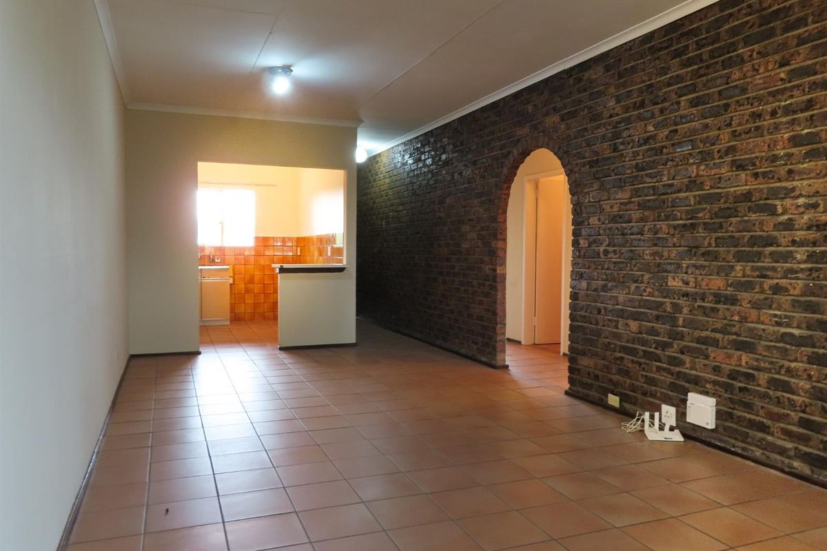 Sunny 2-Bedroom Home with Balcony in Well-Maintained Complex - Photo 3