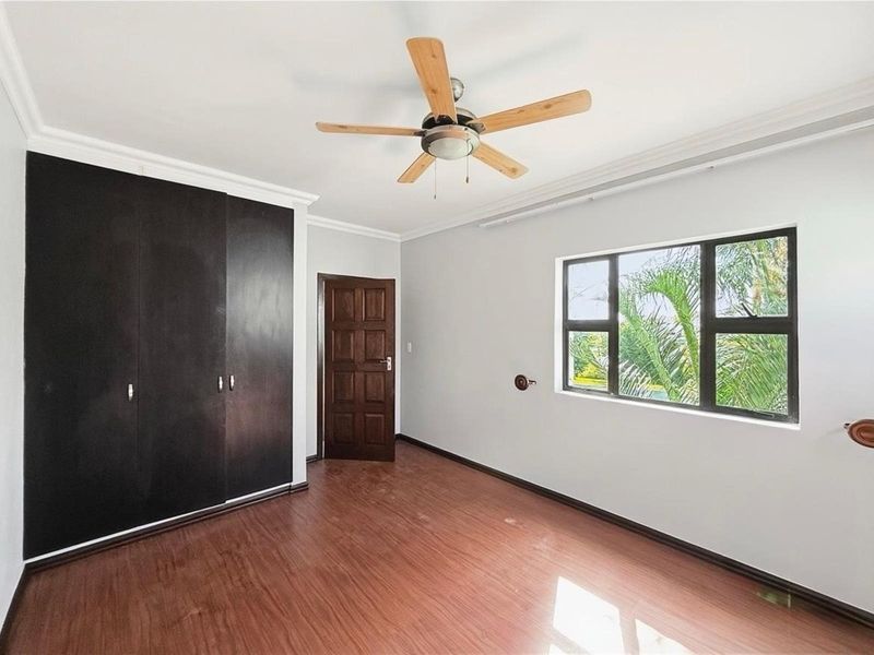 Elegant Family Living on a Generous Stand in Secure Cedar Creek Estate - Photo 10