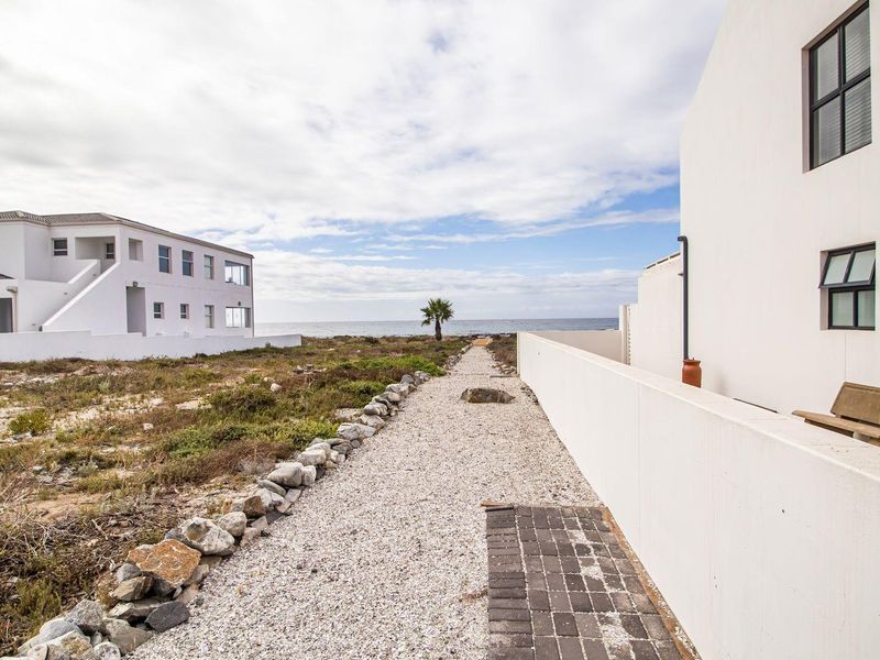 Wake Up to Ocean Views in this Immaculate Home with own Beach Access - Photo 3