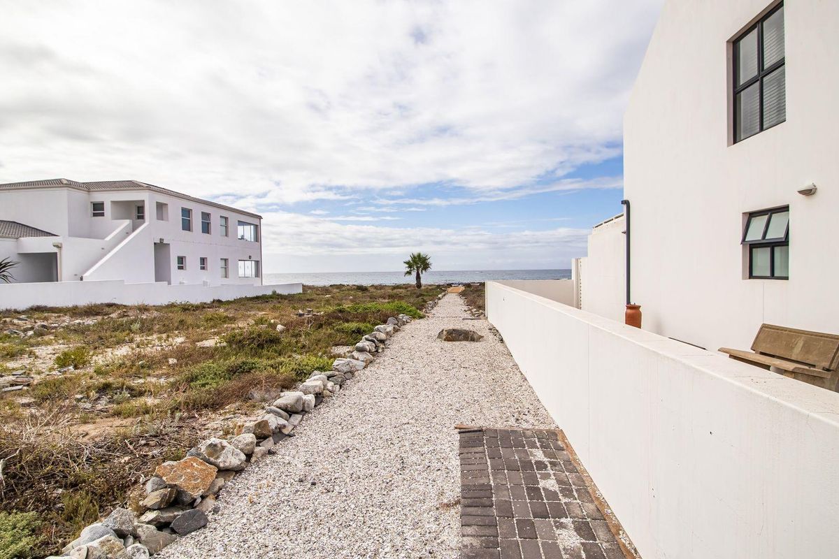 Wake Up to Ocean Views in this Immaculate Home with own Beach Access - Photo 3
