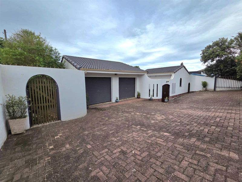 Elegant Seaside Retreat with Guest House Potential - Photo 1