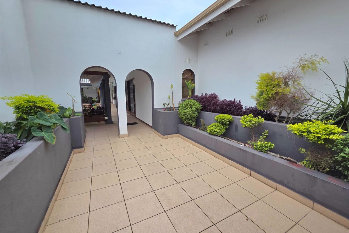 Elegant Seaside Retreat with Guest House Potential - Photo 3
