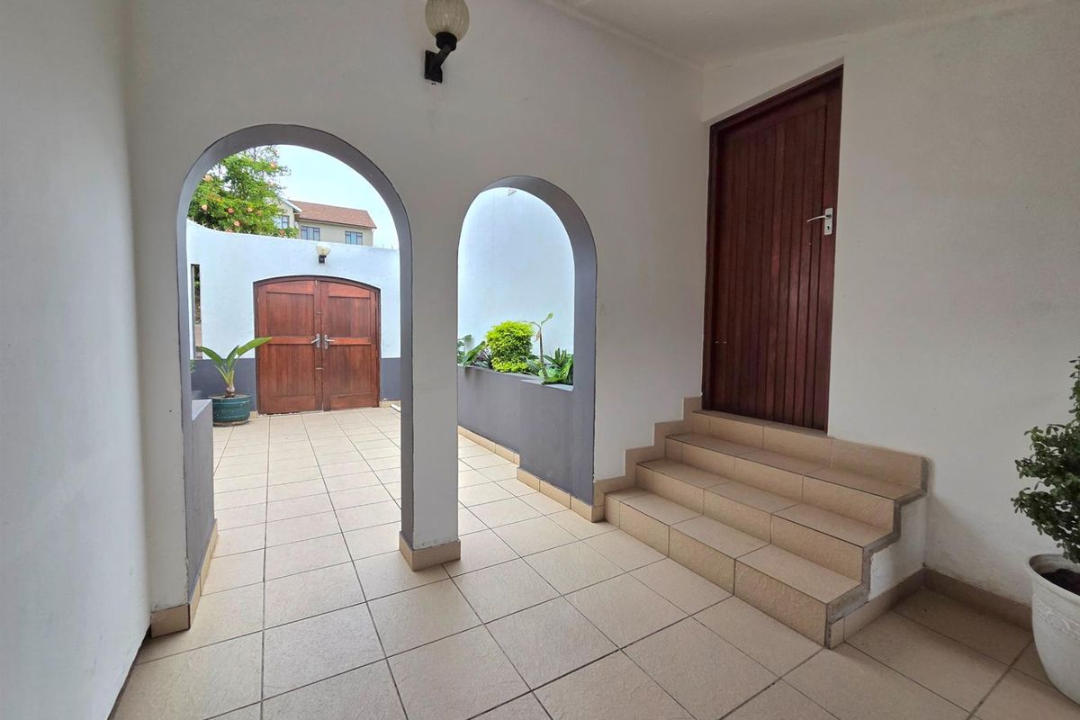 Elegant Seaside Retreat with Guest House Potential - Photo 4