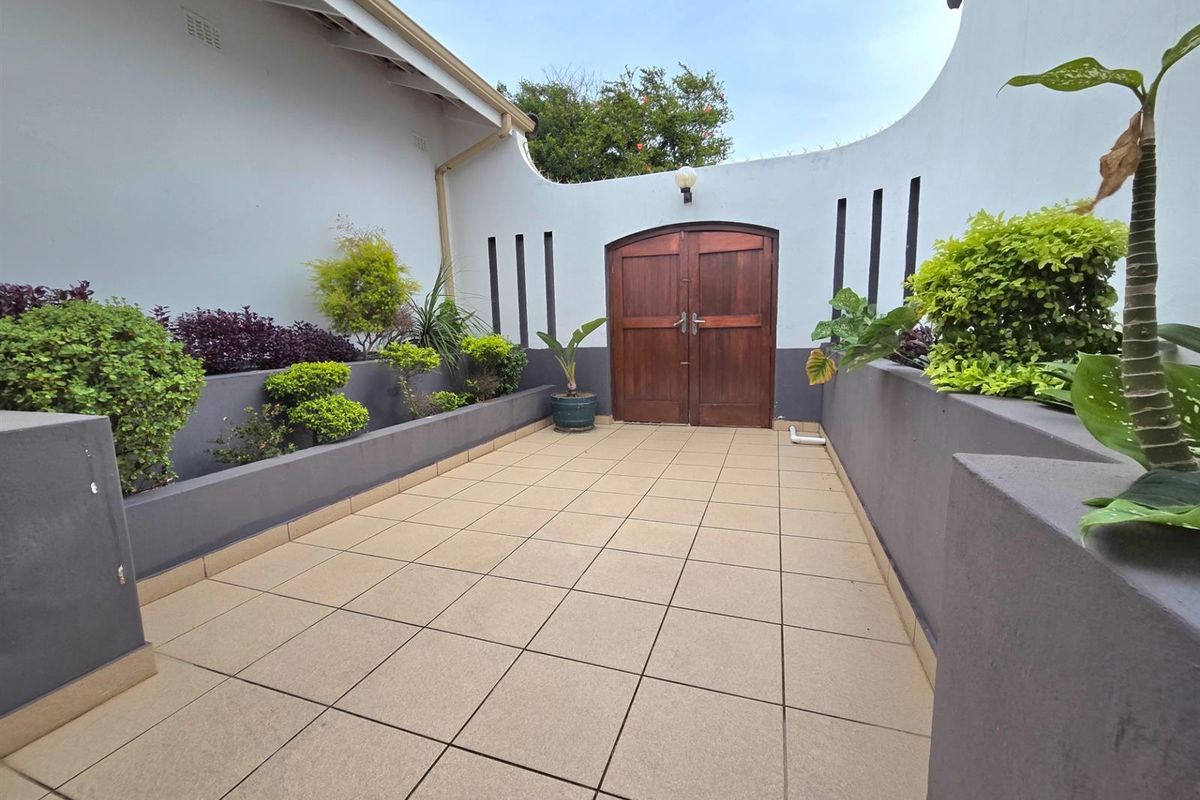 Elegant Seaside Retreat with Guest House Potential - Photo 2