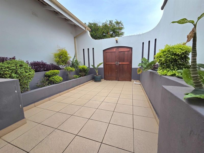 Elegant Seaside Retreat with Guest House Potential - Photo 2