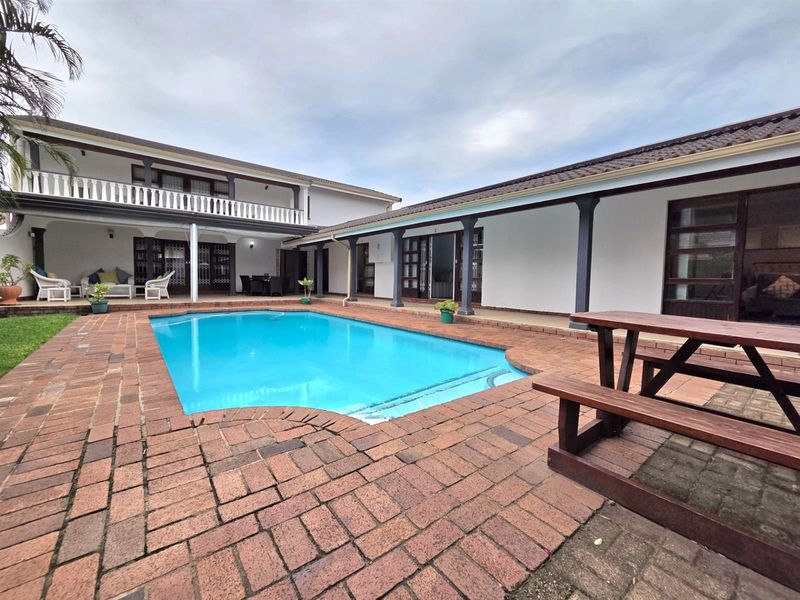 Elegant Seaside Retreat with Guest House Potential - Photo 5