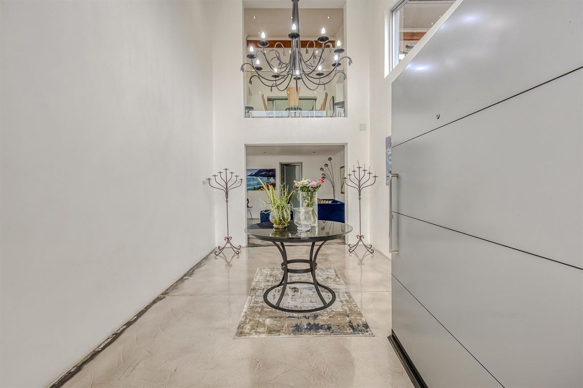 Modern Hillside Luxury with Panoramic Views - Photo 5