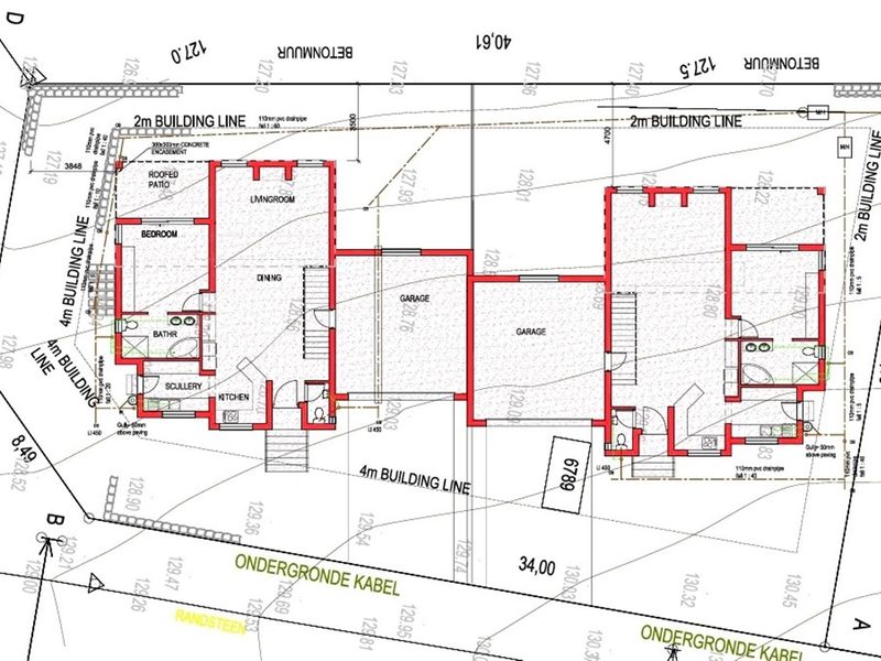 A detailed architectural site plan showing the layout of the property, including building lines, garage, and room configurations.