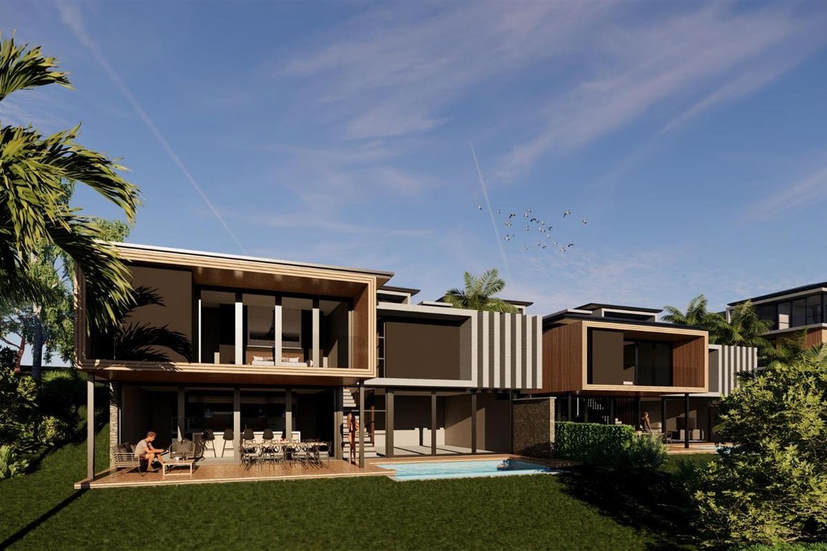 A modern architectural rear elevation featuring a swimming pool, timber decking, and a covered patio area, showcasing contemporary design and outdoor living space.