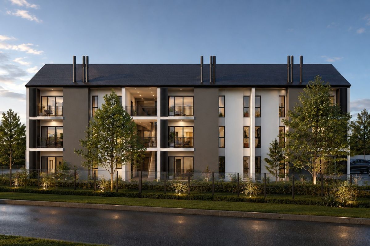 A modern three-story apartment building featuring a contemporary facade, private balconies, and landscaped grounds with exterior lighting.