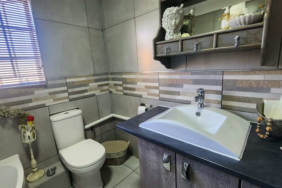 Modern Comfort and Secure Living in Sought-After Pin Oaks - Photo 3