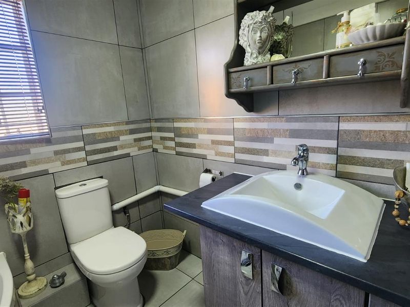 Modern Comfort and Secure Living in Sought-After Pin Oaks - Photo 3
