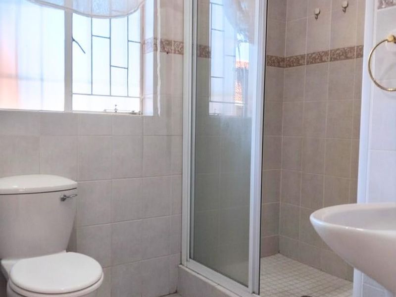 Spacious 3-Bedroom Facebrick Simplex with Private Garden and Double Garage in Quaint Secure Complex - Photo 9