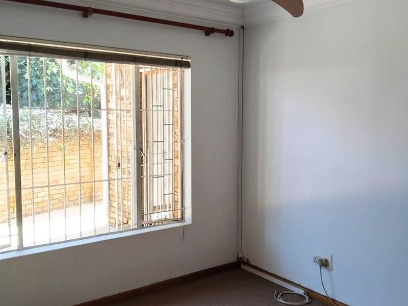 Spacious 3-Bedroom Facebrick Simplex with Private Garden and Double Garage in Quaint Secure Complex - Photo 8