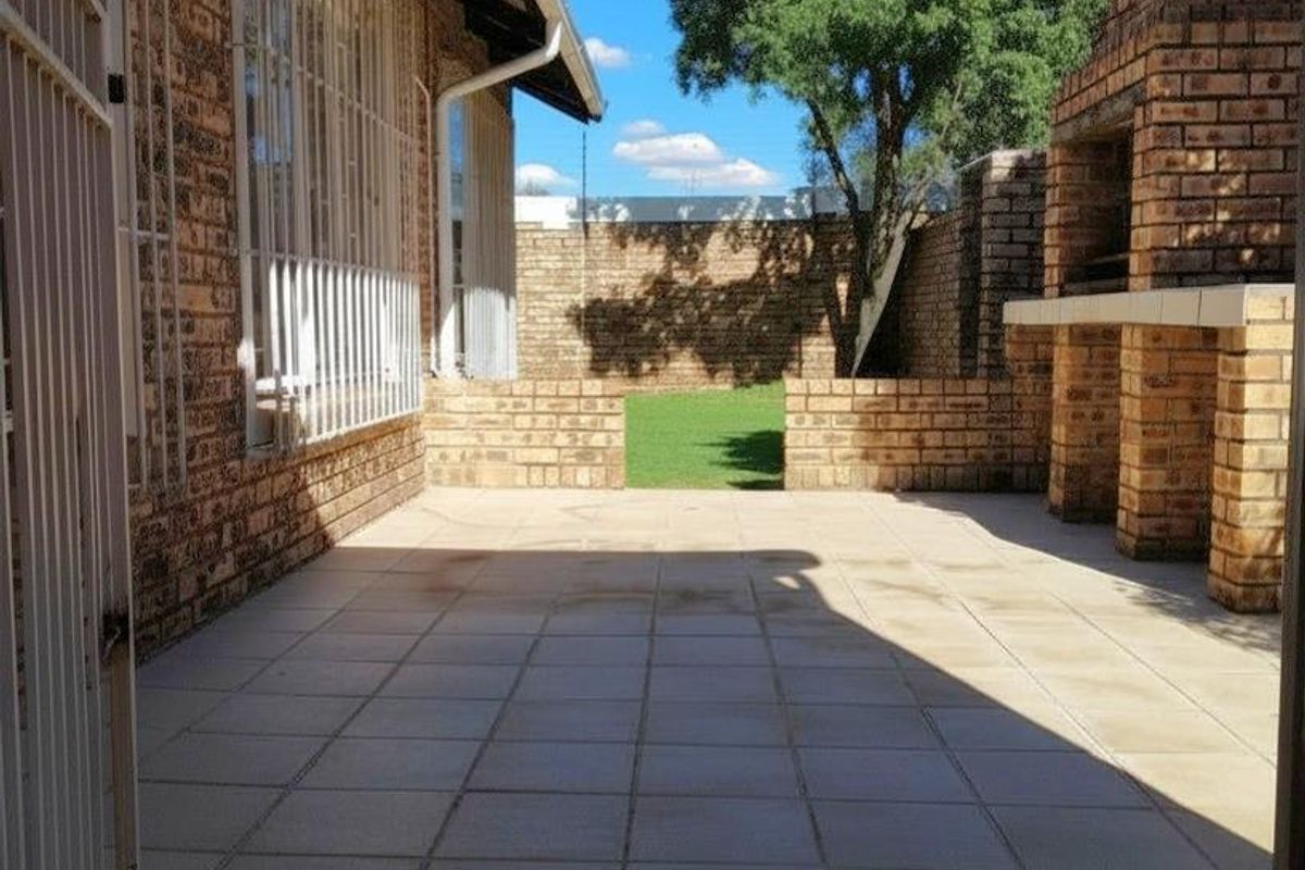 Spacious 3-Bedroom Facebrick Simplex with Private Garden and Double Garage in Quaint Secure Complex - Photo 3