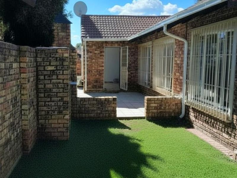 Spacious 3-Bedroom Facebrick Simplex with Private Garden and Double Garage in Quaint Secure Complex - Photo 2