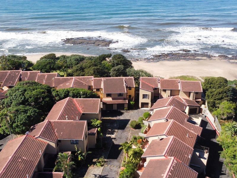 Coastal Comfort Meets Investment Potential - Stylish Duplex Steps from the Beach - Photo 2