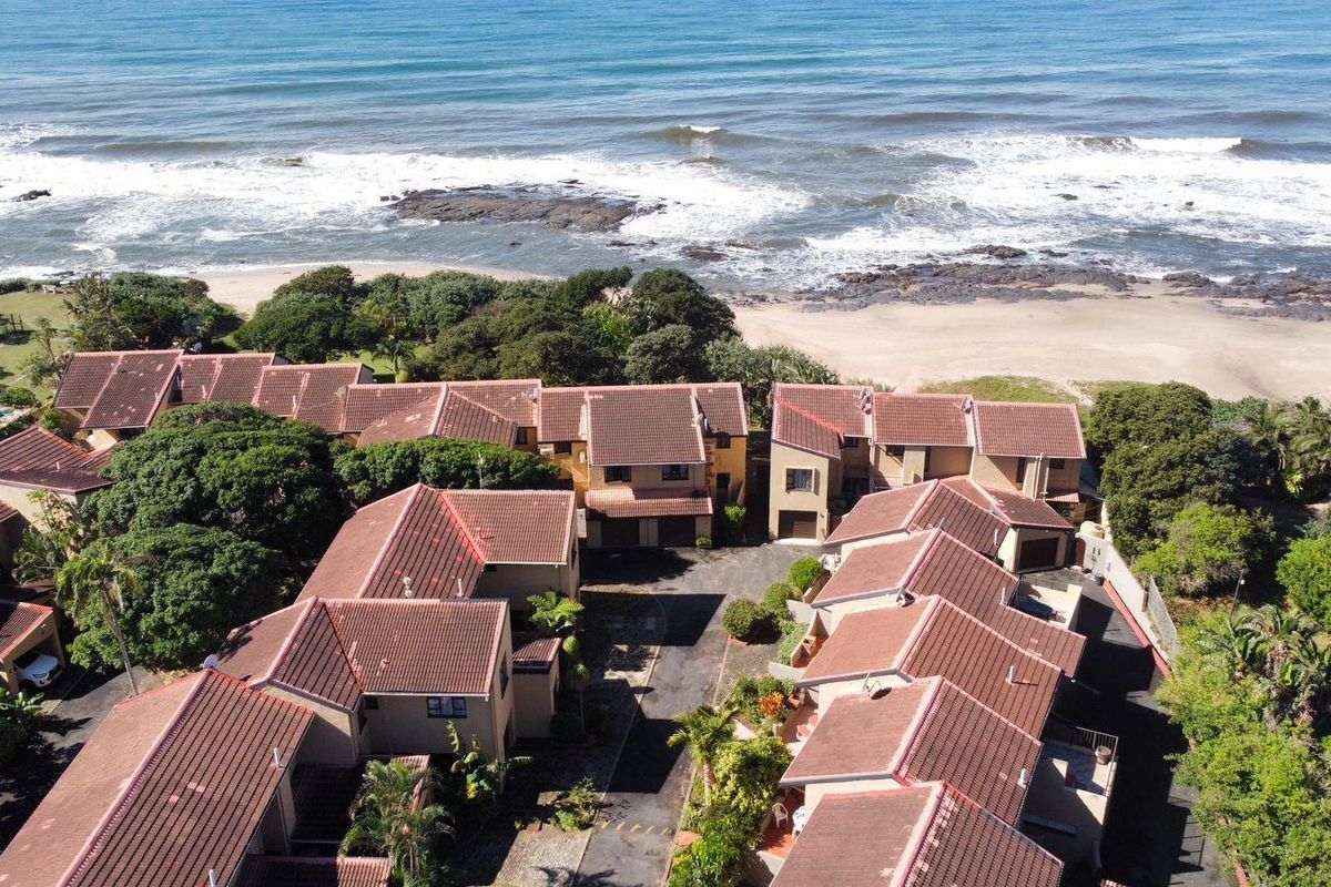 Coastal Comfort Meets Investment Potential - Stylish Duplex Steps from the Beach - Photo 2