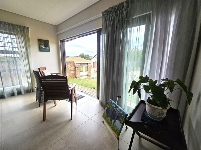 Ideal Lock-Up-and-Go 2 Bedroom House in Bateleur Estate - Photo 4