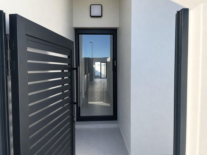 Modern 4-bedroom luxury home in Sandown, Blouberg with premium finishes and indoor-outdoor living - Photo 2