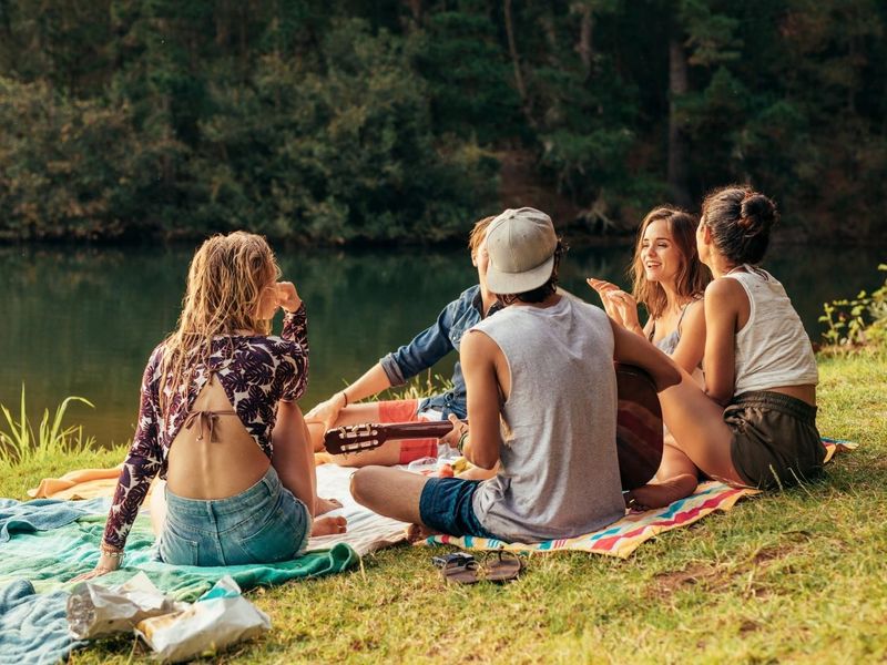 A scenic outdoor setting by a lake, suitable for recreational use and leisure activities.