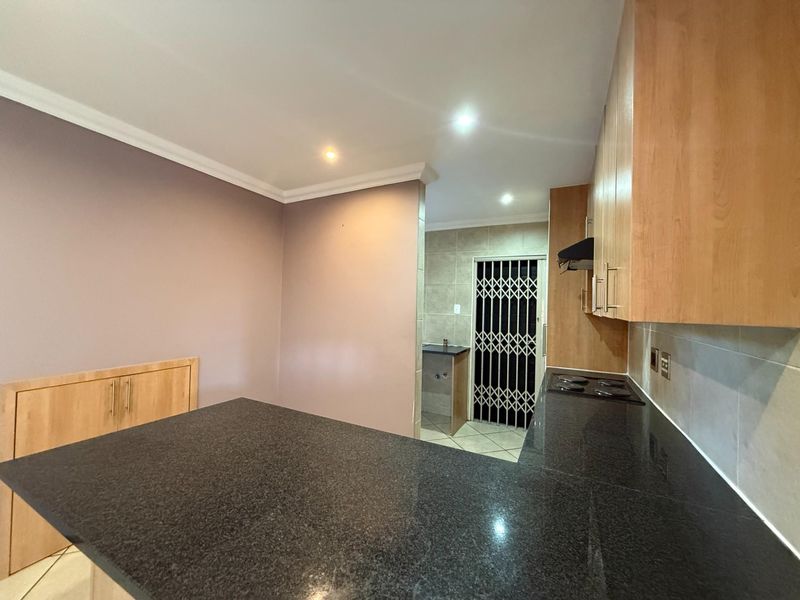 LOCK-UP AND GO SECURITY ESTATE 3 BEDROOM HOME IN RIETVALLEIRAND - Photo 5