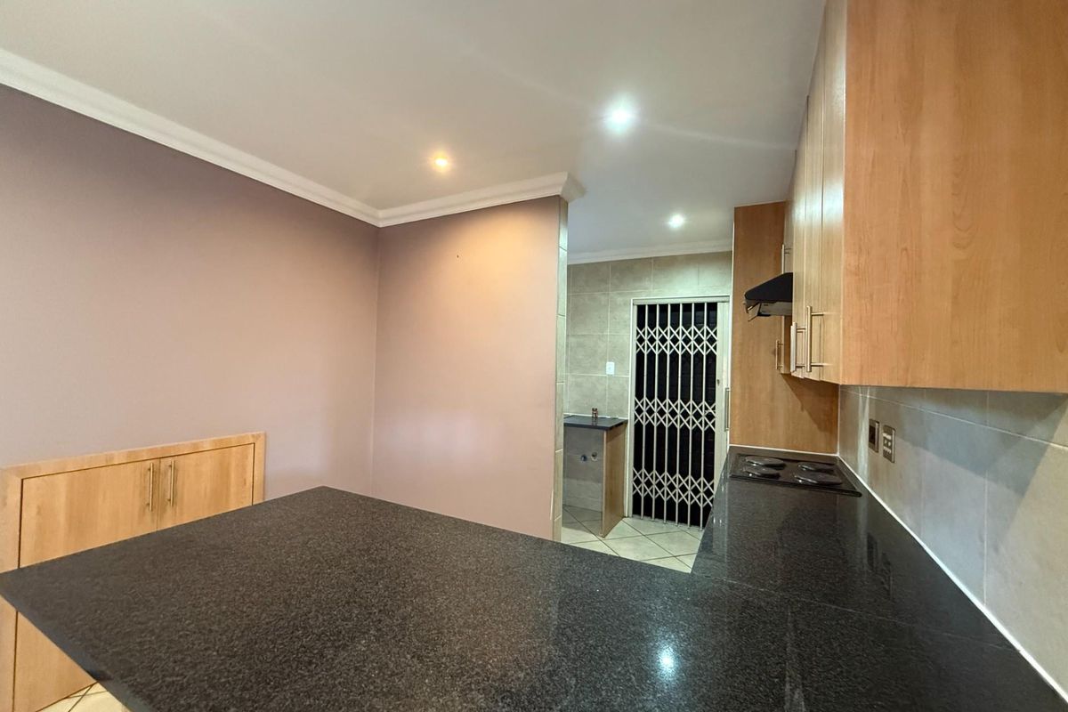 LOCK-UP AND GO SECURITY ESTATE 3 BEDROOM HOME IN RIETVALLEIRAND - Photo 5