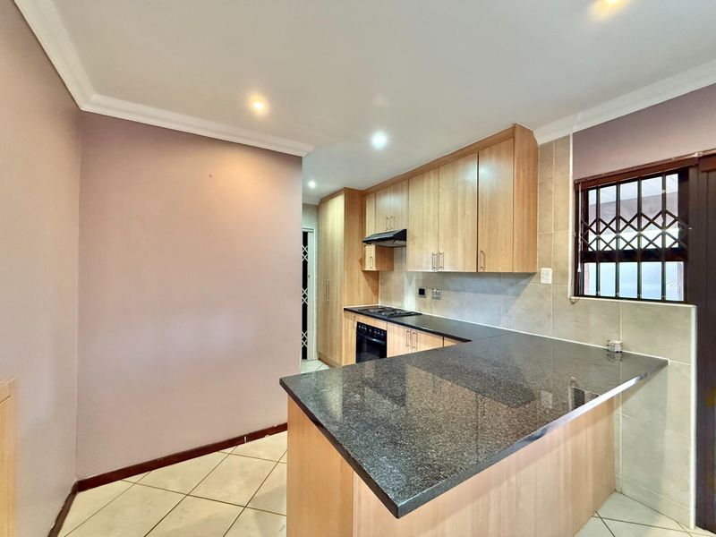 LOCK-UP AND GO SECURITY ESTATE 3 BEDROOM HOME IN RIETVALLEIRAND - Photo 4