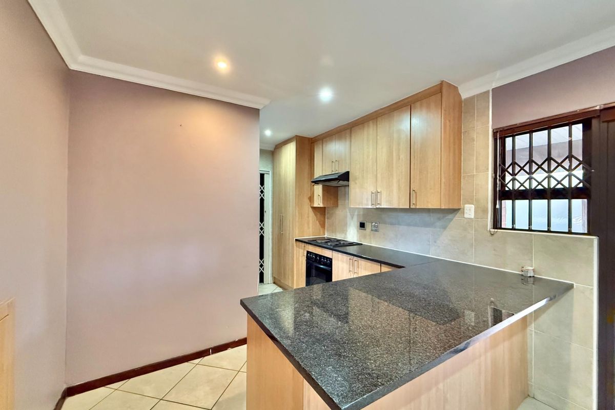 LOCK-UP AND GO SECURITY ESTATE 3 BEDROOM HOME IN RIETVALLEIRAND - Photo 4