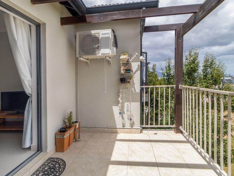 Top Floor Living with Elevated Views and The Balcony Everyone Wants - Photo 6