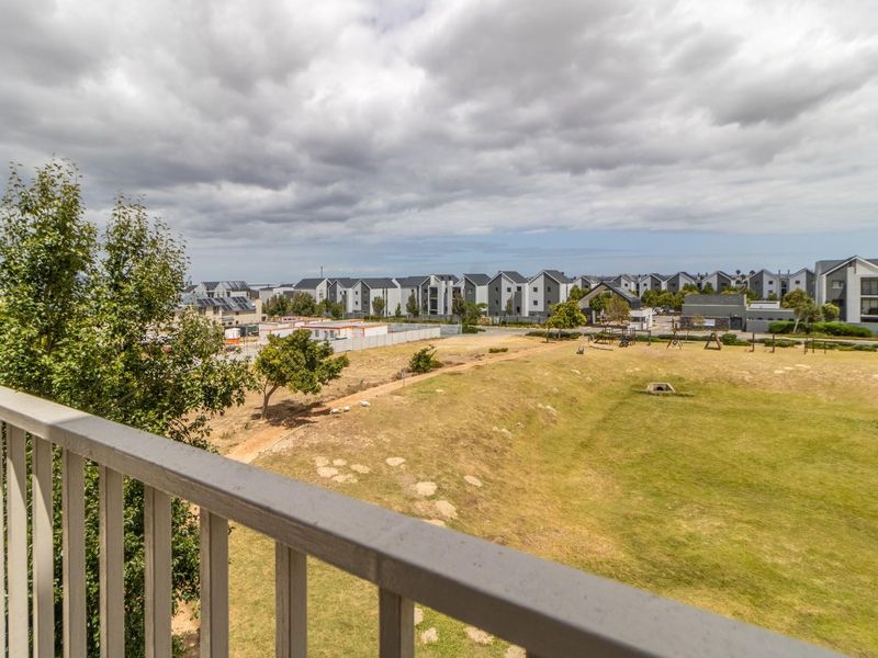 Top Floor Living with Elevated Views and The Balcony Everyone Wants - Photo 9