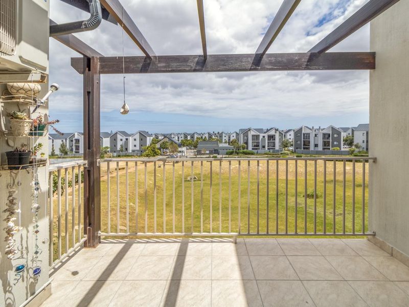 Top Floor Living with Elevated Views and The Balcony Everyone Wants - Photo 8