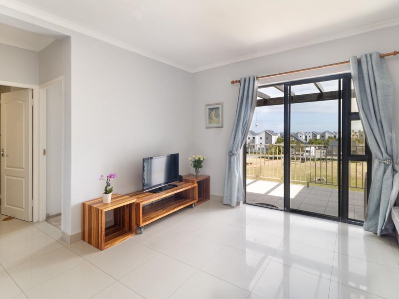 Top Floor Living with Elevated Views and The Balcony Everyone Wants - Photo 5