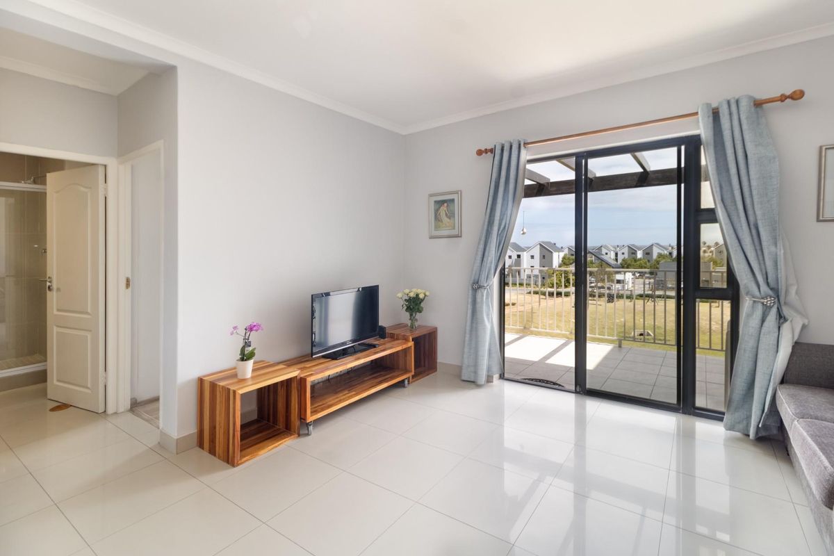 Top Floor Living with Elevated Views and The Balcony Everyone Wants - Photo 5