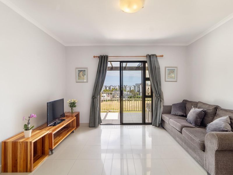 Top Floor Living with Elevated Views and The Balcony Everyone Wants - Photo 4