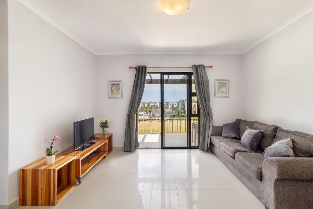 Top Floor Living with Elevated Views and The Balcony Everyone Wants - Photo 4