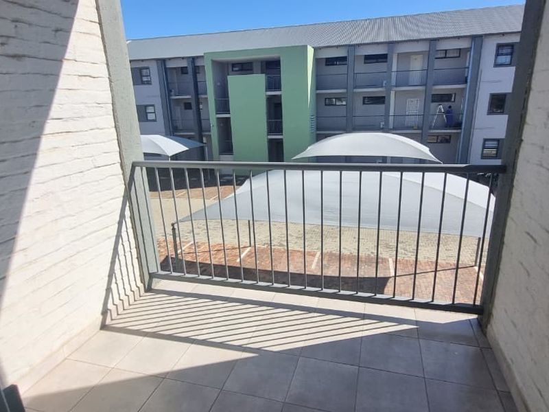 Chic Rynfield Flat with Balcony and Secure Living - Photo 2