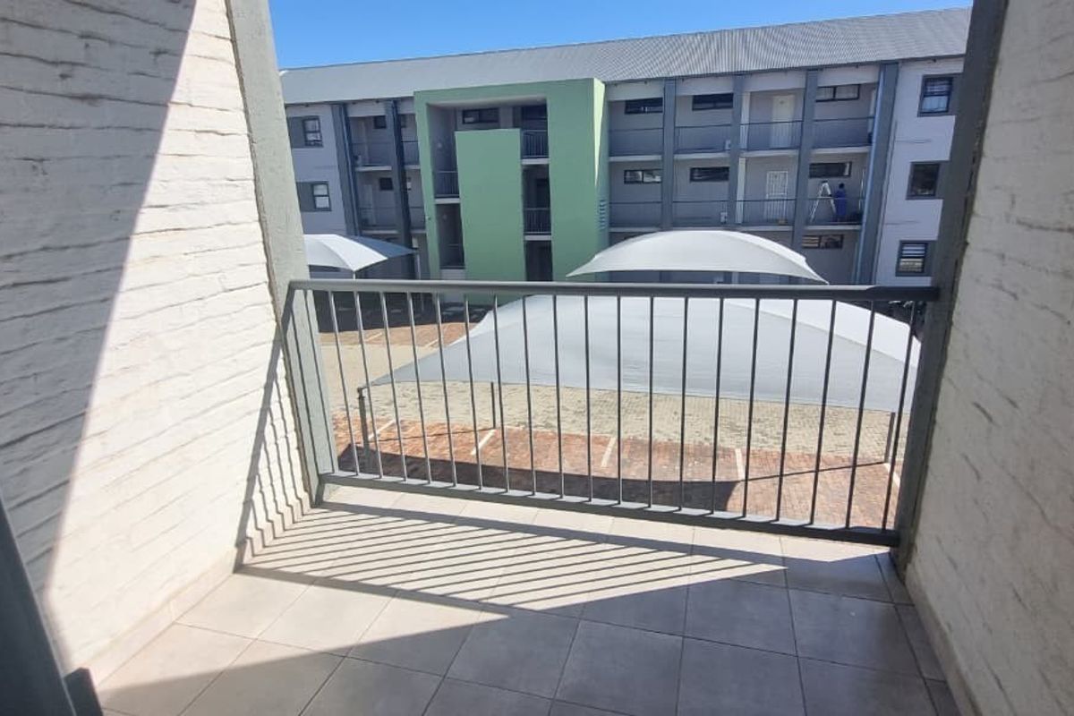 Chic Rynfield Flat with Balcony and Secure Living - Photo 2