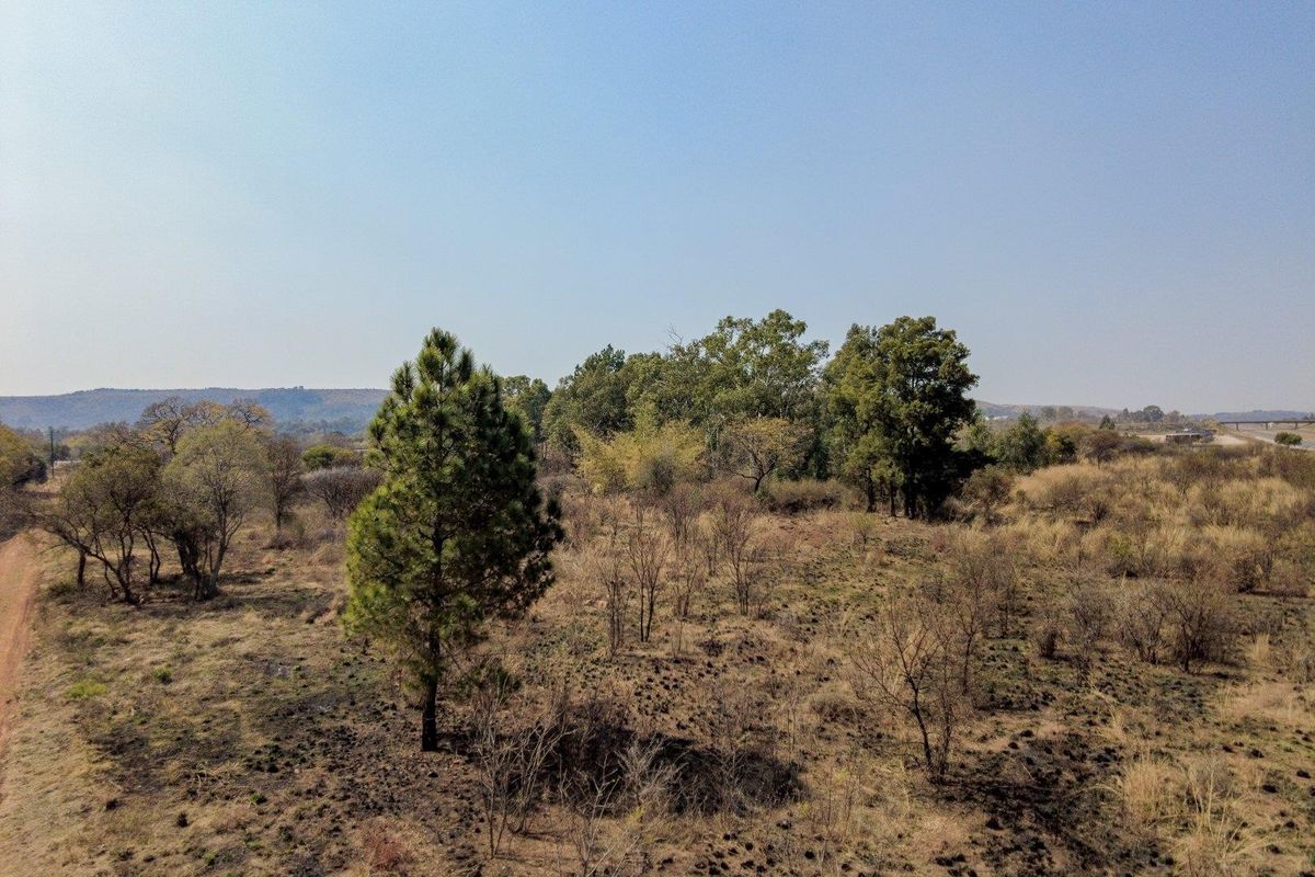 Six hectares level plot adjacent to ahighway and a busy arterial route in a fast-developing area - Photo 2